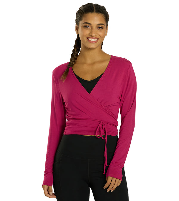 Everyday Yoga Women's Yoga Wrap in Plum Berry, designed for comfort and style during yoga sessions. This wrap features a flattering V-neck and adjustable tie for a customized fit. Ideal for enhancing your yoga wardrobe with a vibrant, functional piece.