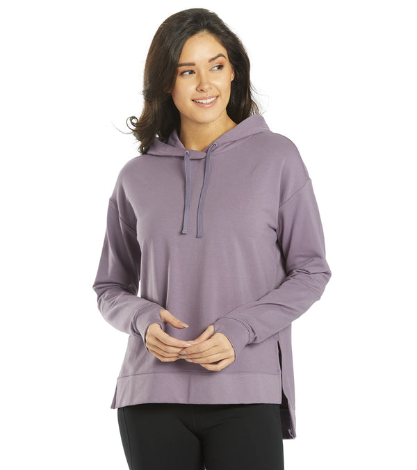 Everyday Yoga Women's Yoga Hoodie in Purple Taupe, designed for comfort and flexibility during yoga sessions. This stylish hoodie features a relaxed fit with a drawstring hood, perfect for layering. Ideal for enhancing your yoga wardrobe with a blend of fashion and functionality