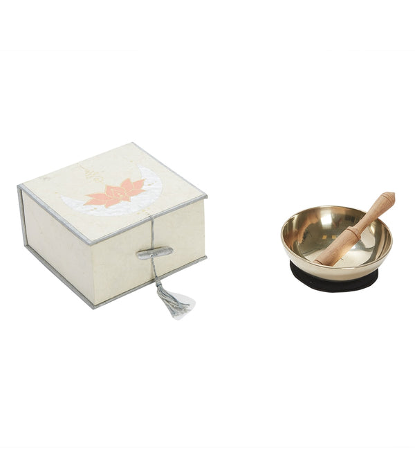 dZi Tibetan Singing Bowl set for yoga, featuring a polished brass bowl with a wooden striker and a decorative storage box. Ideal for enhancing meditation and mindfulness practices. Perfect for yoga enthusiasts seeking authentic Tibetan sound therapy.