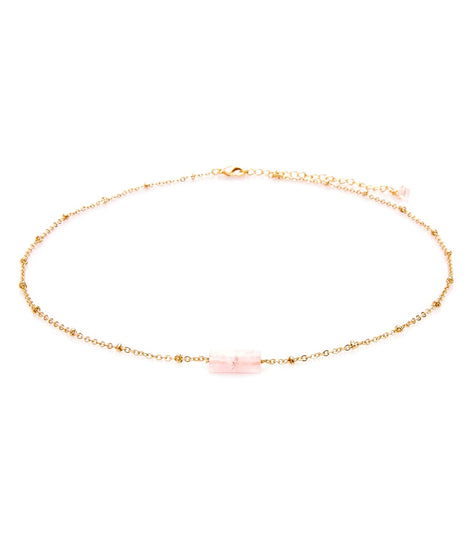 Lotus and Luna Yoga Necklace in Gold and Pink, featuring a delicate gold chain with a pink stone centerpiece, ideal for yoga enthusiasts. This elegant accessory combines style and mindfulness, perfect for enhancing your yoga practice.