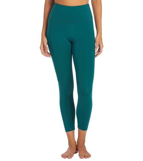 Zobha Women's Yoga 7/8 Leggings in Botanical Garden color, designed for optimal comfort and flexibility during yoga sessions. These high-waisted leggings feature a sleek and supportive fit, ideal for enhancing your workout experience. Perfect for yoga enthusiasts seeking