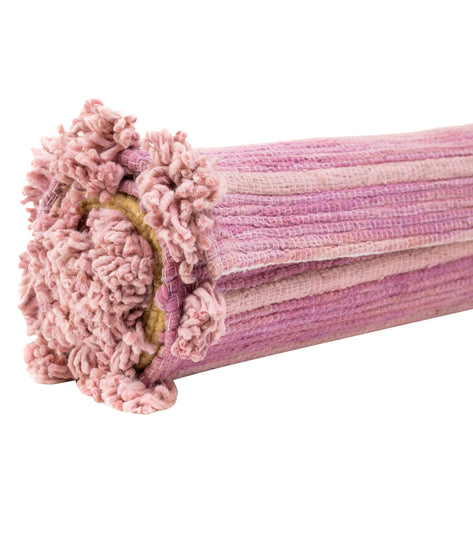 Bennd Yoga's multi-colored yoga rug, featuring a blend of pink hues, is designed for enhancing your yoga practice. This eco-friendly, handwoven rug offers a unique texture and aesthetic appeal, perfect for yogis seeking sustainable products. Ideal for meditation