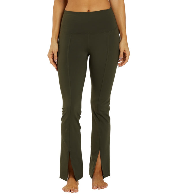 Zobha Women's Straight Leg Yoga Pants in Rosin are designed for comfort and flexibility during yoga sessions. These pants feature a high waistband and a stylish slit at the hem for added breathability. Perfect for enhancing your yoga practice with a sleek, functional