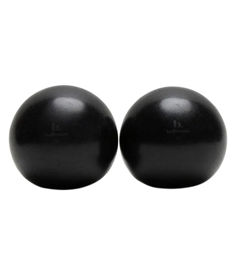 Black fitness balls by B, Halfmoon, designed for yoga exercises. These durable, smooth-surfaced balls are ideal for enhancing balance and stability during workouts. Perfect for yoga enthusiasts seeking reliable fitness equipment.