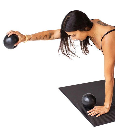 B, Halfmoon yoga fitness equipment in black, featuring a durable exercise mat and weighted balls designed for enhancing yoga routines. Ideal for improving strength and balance during workouts. Perfect for home or studio use, offering versatility and comfort.