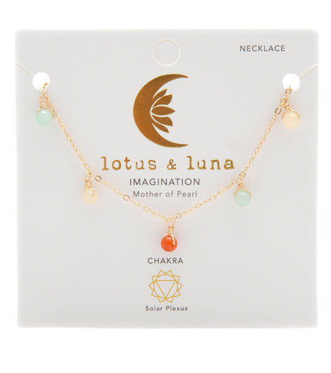 Lotus and Luna Yoga Necklace featuring Mother of Pearl, designed for enhancing imagination and balancing the Solar Plexus Chakra. This elegant piece includes colorful beads on a delicate chain, ideal for yoga enthusiasts seeking spiritual and aesthetic harmony. Perfect for those searching for unique