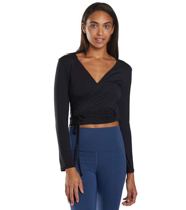 Everyday Yoga Women's Yoga Wrap in Black, designed for comfort and flexibility during yoga sessions. This stylish wrap features a V-neck and long sleeves, perfect for layering in your yoga wardrobe. Ideal for enhancing performance and style in yoga practice.